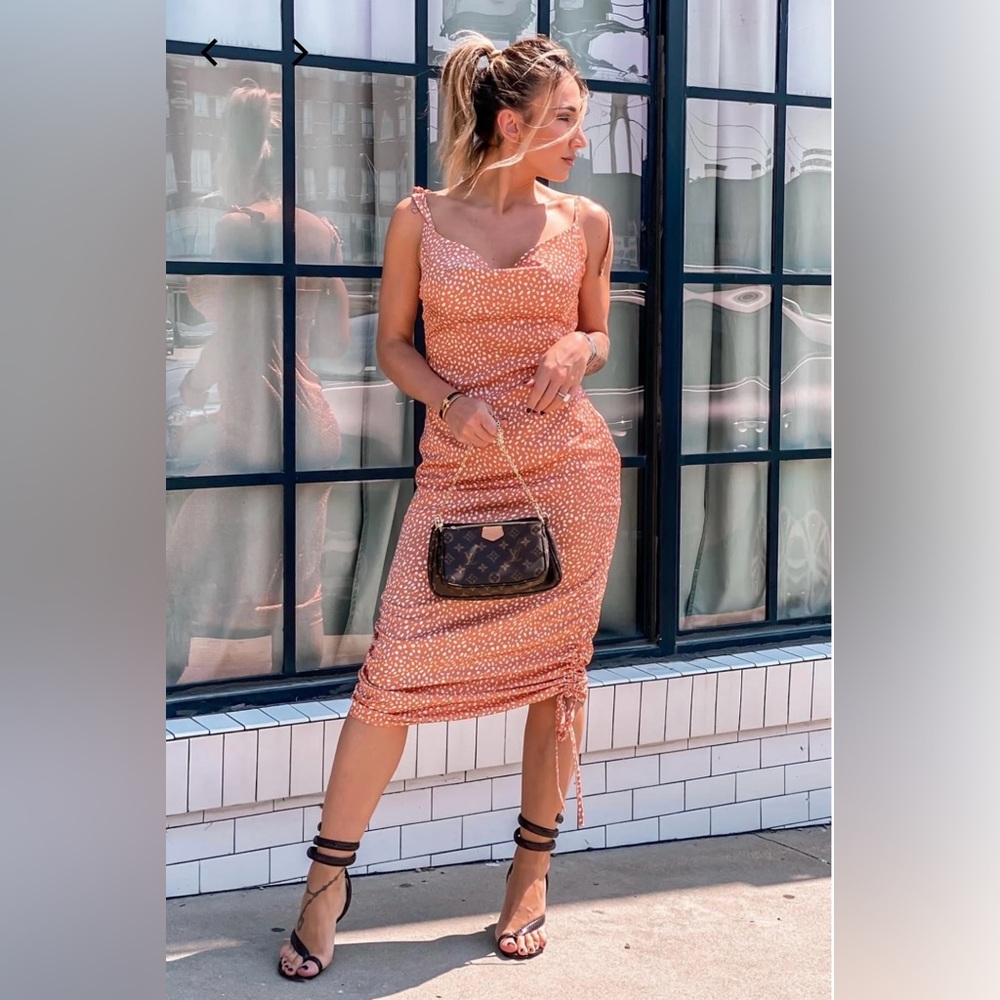 ByEgreis Jamielee Dress. Orange and white polkadot adjustable midi dress